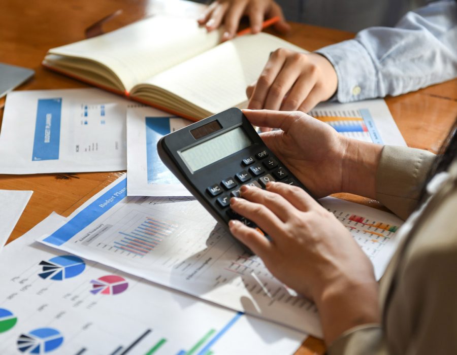 the-accounting-team-is-using-the-calculator-in-the-office-